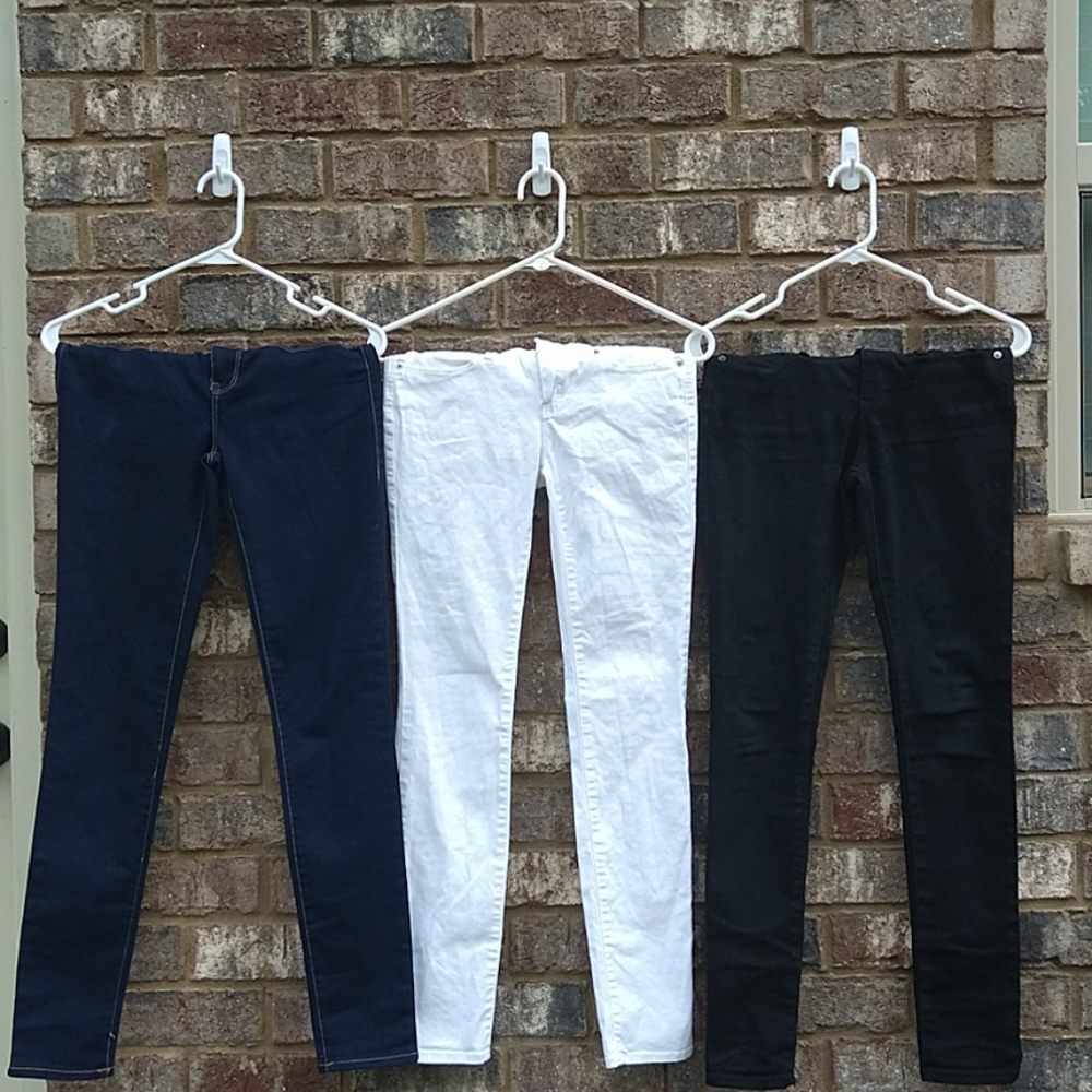 A bundle of 3 skinny leg jeans, 2% spandex